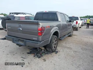 2014 Ford F-150 XL with VIN 1FTFW1EFXEKF21377, listed as a IAAI auction lot 42133053 with 99,924 mi miles and . Bid and sale history available at DreamBid. Image 4.