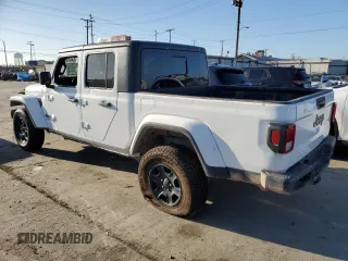 2023 Jeep Gladiator Sport S with VIN 1C6HJTAG4PL528847, listed as a Copart auction lot 64470375 with 36,177 mi miles and Salvage title. Bid and sale history available at DreamBid. Image 2.