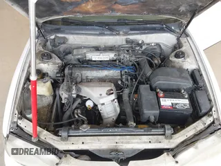 1996 Toyota Camry DX with VIN JT2BG12K3T0401659, listed as a IAAI auction lot 41874795 with 169,406 mi miles. Bid and sale history available at carsss.com. Image 10.