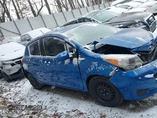 2014 Toyota Yaris L with VIN JTDKTUD34ED581773, listed as a IAAI auction lot 41620586 with 239,100 mi miles. Bid and sale history available at carsss.com. Image 13.