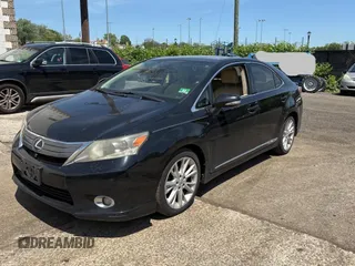 2010 Lexus HS 250h with VIN JTHBB1BA1A2020910, listed as a Copart auction lot 57009775 with 263,515 mi miles and Clean Title. Bid and sale history available at DreamBid. Image 2.