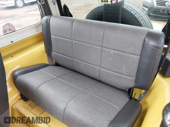 2000 Jeep Wrangler SE with VIN 1J4FA29P6YP770414, listed as a IAAI auction lot 42586842 with 289,774 mi miles and . Bid and sale history available at DreamBid. Image 8.