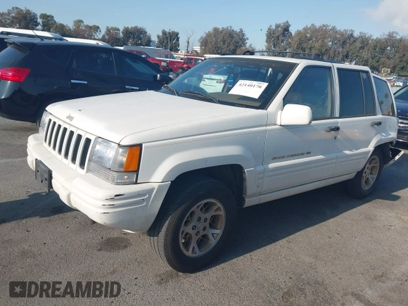 1998 Jeep Grand Cherokee with VIN 1J4FX78S2WC281501, listed as a IAAI auction lot 42140170 with 177,575 mi miles and . Bid and sale history available at DreamBid. Image 2.