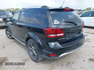 2015 Dodge Journey Crossroad with VIN 3C4PDCGB2FT713389, listed as a IAAI auction lot 42103272 with 135,974 mi miles and . Bid and sale history available at DreamBid. Image 3.