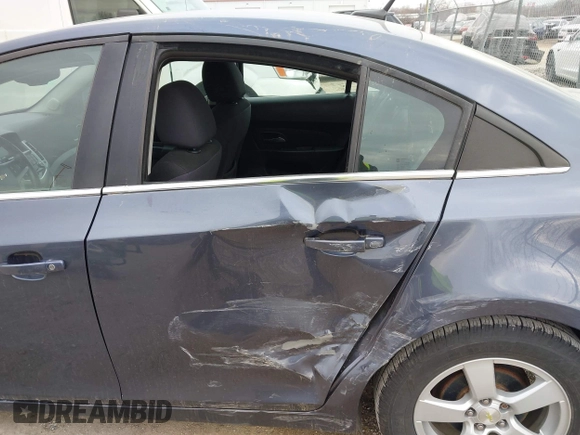 2014 Chevrolet Cruze 1LT with VIN 1G1PC5SB3E7467938, listed as a IAAI auction lot 41900700 with 125,040 mi miles and . Bid and sale history available at DreamBid. Image 6.