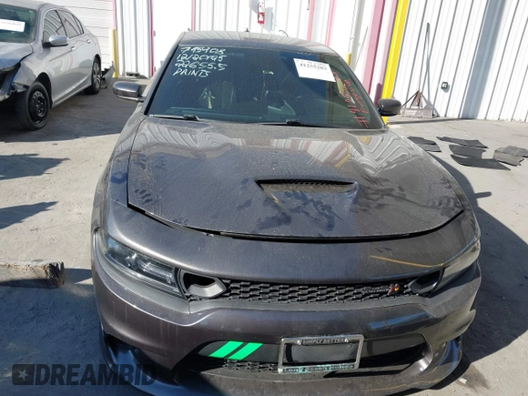 2019 Dodge Charger Scat Pack with VIN 2C3CDXGJ2KH564051, listed as a IAAI auction lot 41255283 with 64,687 mi miles and . Bid and sale history available at DreamBid. Image 12.