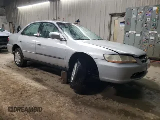 2000 Honda Accord LX z VIN 1HGCG5643YA059339, wystawiony jako Copart lot #42153695 z przebiegiem 169 380 mil mil oraz Szkoda całkowita • Salvage title. Historia ofert i sprzedaży dostępna na DreamBid. Obrazek 4.