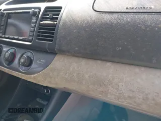 2002 Toyota Camry XLE z VIN JTDBF30K820027492, wystawiony jako IAAI lot #42158162 z przebiegiem 224 291 mil mil oraz . Historia ofert i sprzedaży dostępna na DreamBid. Obrazek 12.