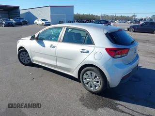 2020 Kia Rio S with VIN 3KPA25AD7LE348113, listed as a IAAI auction lot 41365528 with 43,633 mi miles and . Bid and sale history available at DreamBid. Image 3.