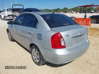2008 Hyundai Accent GLS with VIN KMHCN46CX8U214890, listed as a IAAI auction lot 41843006 with 179,550 mi miles. Bid and sale history available at carsss.com. Image 3.