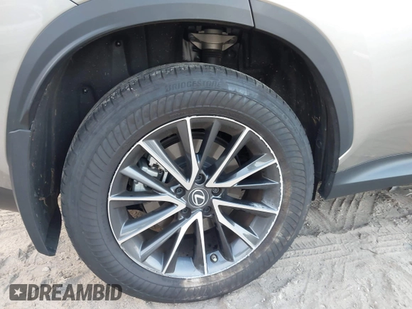 2023 Lexus NX with VIN 2T2GGCEZ1PC019526, listed as a IAAI auction lot 40700034 with 13,258 mi miles. Bid and sale history available at carsss.com. Image 17.