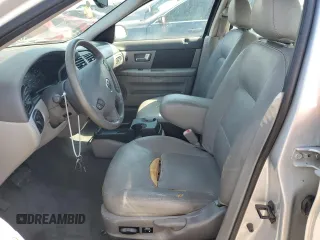 2002 Mercury Sable LS z VIN 1MEHM55SX2A619019, wystawiony jako Copart lot #74205254 z przebiegiem 71 677 mil mil oraz Szkody całkowita. Historia ofert i sprzedaży dostępna na DreamBid. Obrazek 7.