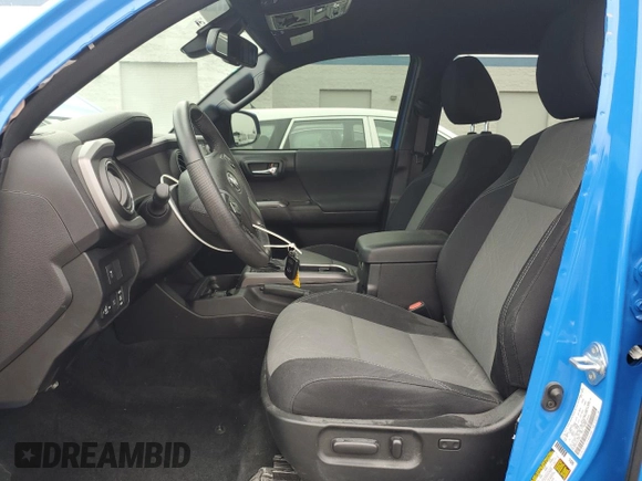 2021 Toyota Tacoma SR with VIN 3TMCZ5AN1MM426566, listed as a Copart auction lot 59613315 with 28,903 mi miles and Salvage title. Bid and sale history available at DreamBid. Image 7.