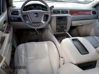2014 GMC Yukon SLT with VIN 1GKS1CE05ER197674, listed as a Copart auction lot 45934674 with 130,623 mi miles and Salvage Title. Bid and sale history available at carsss.com. Image 8.