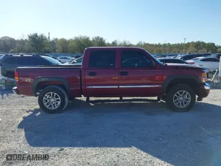 2006 GMC Sierra 1500 SLT with VIN 2GTEK13T761129104, listed as a IAAI auction lot 41811270 with 128,508 mi miles. Bid and sale history available at carsss.com. Image 13.