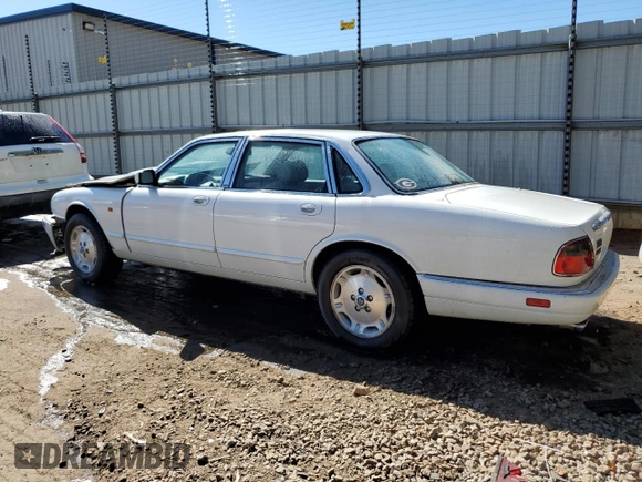 1996 Jaguar XJ with VIN SAJHX1747TC767829, listed as a Copart auction lot 76677444 with Not provided miles and Salvage title. Bid and sale history available at DreamBid. Image 2.