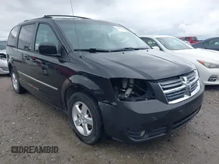 2010 Dodge Grand Caravan SXT with VIN 2D4RN5D11AR154526, listed as a IAAI auction lot 42009099 with 239,343 mi miles and . Bid and sale history available at DreamBid. Image 1.