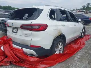 2020 BMW X5 sDrive40i with VIN 5UXCR4C08L9C07579, listed as a IAAI auction lot 41871208 with Not Provided miles and . Bid and sale history available at DreamBid. Image 4.