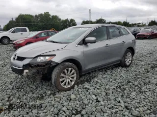 2010 Mazda CX-7 SV z VIN JM3ER2W53A0301123, wystawiony jako Copart lot #58711605 z przebiegiem 236 428 mil mil oraz Szkoda całkowita • Salvage title. Historia ofert i sprzedaży dostępna na DreamBid. Obrazek 1.