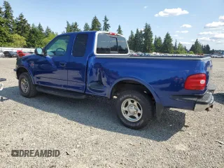 1998 Ford F-150 with VIN 2FTZX08W2WCA63145, listed as a Copart auction lot 58833155 with 251,370 mi miles and Clean title. Bid and sale history available at DreamBid. Image 2.
