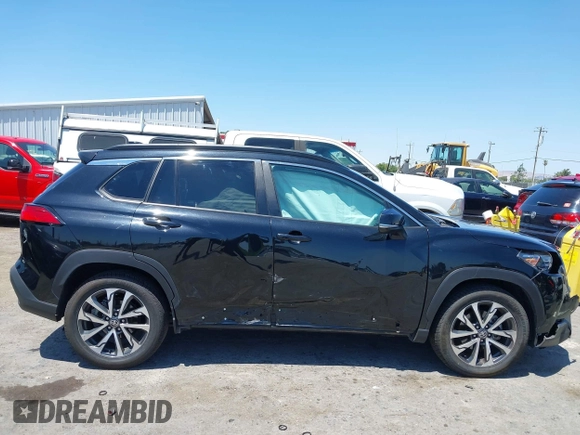 2022 Toyota Corolla Cross XLE with VIN 7MUEAABG3NV042742, listed as a IAAI auction lot 42595052 with 54,299 mi miles and . Bid and sale history available at DreamBid. Image 6.