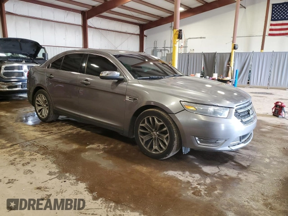 2014 Ford Taurus Limited with VIN 1FAHP2F8XEG113644, listed as a Copart auction lot 51275645 with 143,816 mi miles and Salvage title. Bid and sale history available at DreamBid. Image 4.