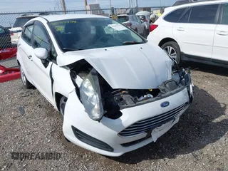 2018 Ford Fiesta SE z VIN 3FADP4EJXJM100407, wystawiony jako IAAI lot #42285374 z przebiegiem 90 261 mil mil oraz . Historia ofert i sprzedaży dostępna na DreamBid. Obrazek 6.