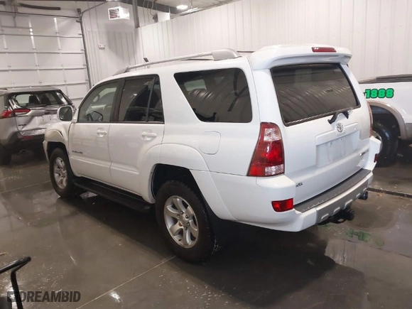 2005 Toyota 4Runner SR5 with VIN JTEBT14R450051986, listed as a IAAI auction lot 41597512 with 113,042 mi miles. Bid and sale history available at carsss.com. Image 3.