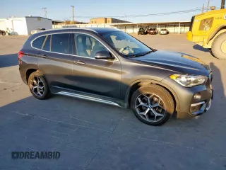 2019 BMW X1 xDrive28i with VIN WBXHT3C51K3H34687, listed as a Copart auction lot 50135845 with 59,549 mi miles and Salvage Title. Bid and sale history available at carsss.com. Image 4.