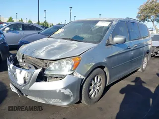 2010 Honda Odyssey EX with VIN 5FNRL3H41AB016671, listed as a IAAI auction lot 42465200 with 167,214 mi miles and . Bid and sale history available at DreamBid. Image 2.
