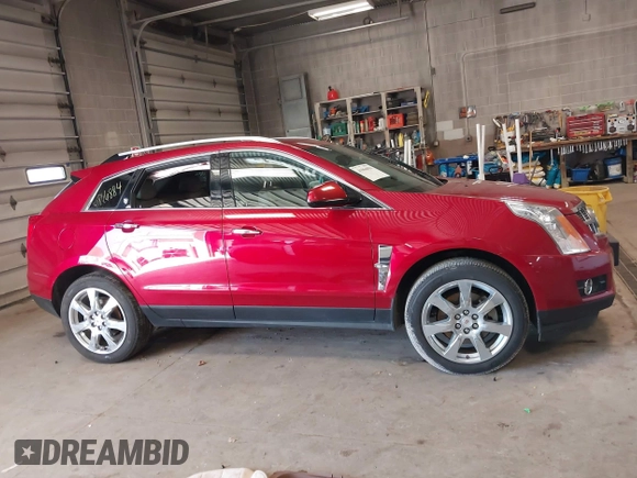 2011 Cadillac SRX Premium Collection with VIN 3GYFNFEY9BS550512, listed as a IAAI auction lot 41866884 with 110,675 mi miles. Bid and sale history available at carsss.com. Image 13.