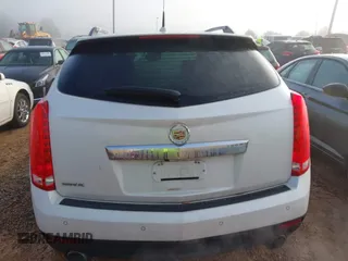 2011 Cadillac SRX Performance Collection with VIN 3GYFNBEY4BS600709, listed as a IAAI auction lot 40858453 with 148,769 mi miles. Bid and sale history available at carsss.com. Image 16.