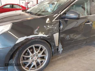 2014 Cadillac SRX Premium Collection z VIN 3GYFNGE38ES606731, wystawiony jako IAAI lot #41844450 z przebiegiem 156 541 mil mil oraz . Historia ofert i sprzedaży dostępna na DreamBid. Obrazek 6.