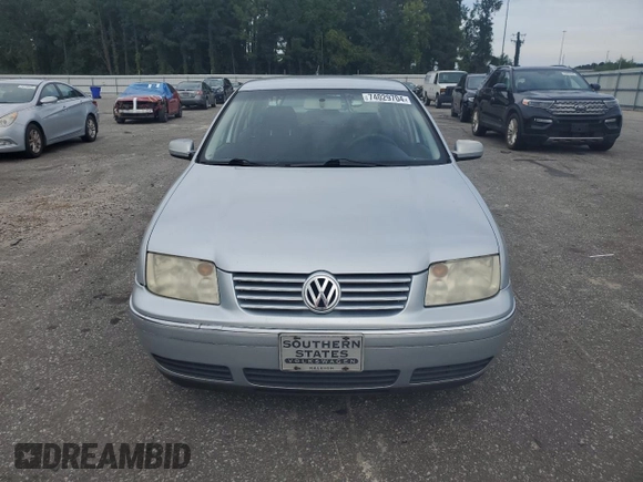 2004 Volkswagen Jetta GL with VIN 3VWRR69M34M108439, listed as a Copart auction lot 74029704 with 296,984 mi miles and Salvage title. Bid and sale history available at DreamBid. Image 5.
