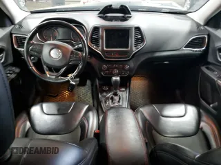 2020 Jeep Cherokee Trailhawk with VIN 1C4PJMBX9LD582951, listed as a Copart auction lot 60152935 with 61,448 mi miles and Salvage title. Bid and sale history available at DreamBid. Image 8.