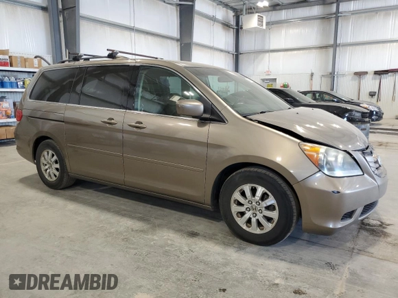 2009 Honda Odyssey EX с VIN 5FNRL38479B019599, выставлен на аукционе Copart как лот 56375175 с пробегом 241 526 миль миль и Списание • Salvage title. История ставок и продаж доступна на DreamBid. Изображение 4.