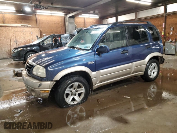 2002 Suzuki Grand Vitara JLX z VIN JS3TD62V524160739, wystawiony jako Copart lot #88416995 z przebiegiem 98 820 mil mil oraz Szkoda całkowita • Salvage title. Historia ofert i sprzedaży dostępna na DreamBid. Obrazek 1.