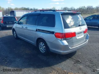 2010 Honda Odyssey EX-L with VIN 5FNRL3H72AB018679, listed as a IAAI auction lot 41988786 with 235,908 mi miles. Bid and sale history available at carsss.com. Image 3.