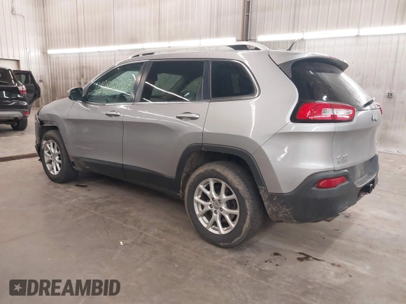 2014 Jeep Cherokee Altitude with VIN 1C4PJMCB9EW149754, listed as a IAAI auction lot 41983427 with 199,810 mi miles and . Bid and sale history available at DreamBid. Image 3.