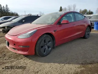 2022 Tesla Model 3 with VIN 5YJ3E1EA8NF167107, listed as a Copart auction lot 48128335 with 218,144 mi miles and Salvage Title. Bid and sale history available at carsss.com. Image 1.