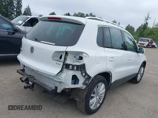 2016 Volkswagen Tiguan SE z VIN WVGBV7AX4GW508103, wystawiony jako IAAI lot #42473754 z przebiegiem 104 978 mil mil oraz . Historia ofert i sprzedaży dostępna na DreamBid. Obrazek 4.