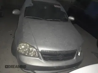 2006 Suzuki Forenza z VIN KL5JD56ZX6K391351, wystawiony jako Copart lot #69653694 z przebiegiem 119 389 mil mil oraz Szkody całkowita. Historia ofert i sprzedaży dostępna na DreamBid. Obrazek 5.