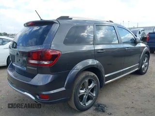 2016 Dodge Journey Crossroad Plus z VIN 3C4PDCGB1GT203035, wystawiony jako IAAI lot #41518100 z przebiegiem 147 437 mil mil oraz . Historia ofert i sprzedaży dostępna na DreamBid. Obrazek 4.