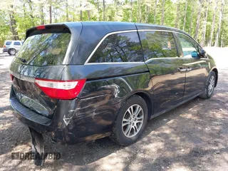 2013 Honda Odyssey EX-L with VIN 5FNRL5H69DB025040, listed as a IAAI auction lot 42078699 with 181,470 mi miles and . Bid and sale history available at carsss.com. Image 4.