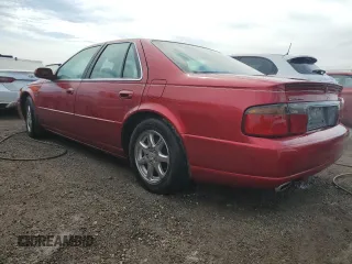 1999 Cadillac Seville Touring STS z VIN 1G6KY5496XU926352, wystawiony jako Copart lot #74711014 z przebiegiem 140 915 mil mil oraz Nie do naprawy • Non repairable. Historia ofert i sprzedaży dostępna na DreamBid. Obrazek 2.