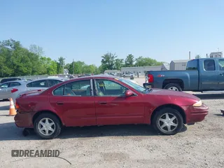 2002 Oldsmobile Alero GL1 z VIN 1G3NL52E02C215561, wystawiony jako IAAI lot #42230290 z przebiegiem 177 176 mil mil oraz . Historia ofert i sprzedaży dostępna na DreamBid. Obrazek 14.