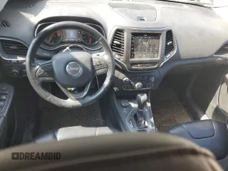 2019 Jeep Cherokee Trailhawk with VIN 1C4PJMBX0KD361639, listed as a Copart auction lot 60549865 with 95,888 mi miles and Salvage title. Bid and sale history available at DreamBid. Image 8.