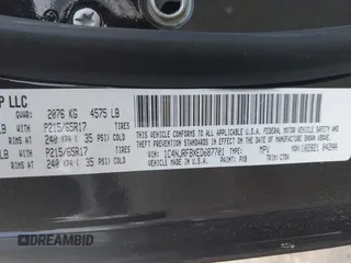 2014 Jeep Patriot Latitude with VIN 1C4NJRFBXED687701, listed as a IAAI auction lot 41399153 with 109,783 mi miles. Bid and sale history available at carsss.com. Image 9.