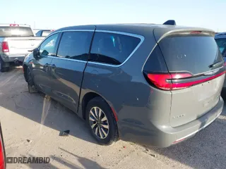 2023 Chrysler Pacifica Hybrid Touring L with VIN 2C4RC1L75PR599135, listed as a IAAI auction lot 39785830 with 28,781 mi miles. Bid and sale history available at carsss.com. Image 3.