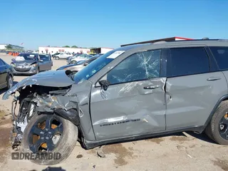 2019 Jeep Grand Cherokee Laredo E with VIN 1C4RJFAG2KC611457, listed as a IAAI auction lot 42212982 with 97,603 mi miles and . Bid and sale history available at DreamBid. Image 6.